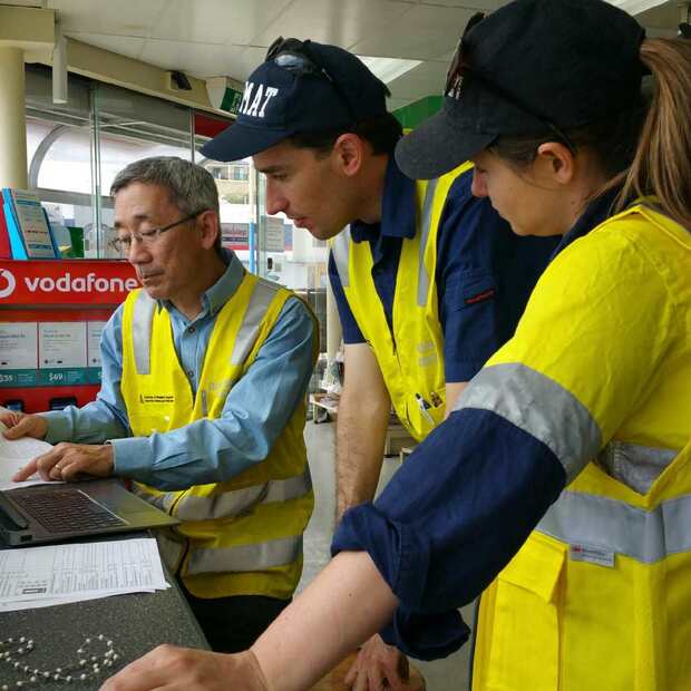 Dangerous Goods officers Lawry Lim, Peter Xanthis and Erin James conducting the online audit at a Scarborough service station.