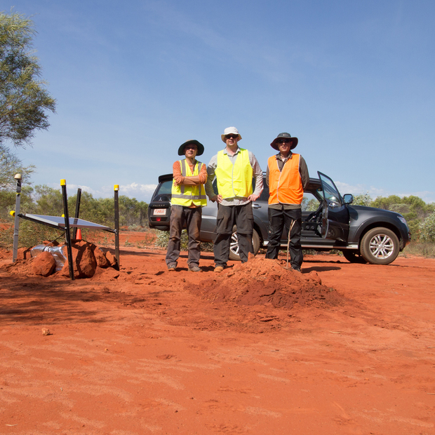 Dr Huaiyu Yuan, Dr Klaus Gessner and Dr Liang Zhao stand next to the monitoring station in Broome